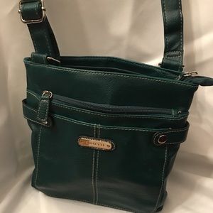 Rosetti forest green adjustable hand bag.
